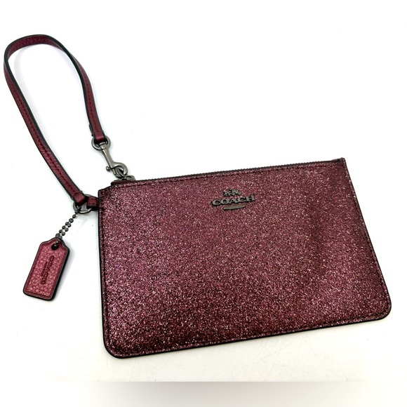 Like New COACH Sparkle Purple Wrislet - Picture 1 of 10